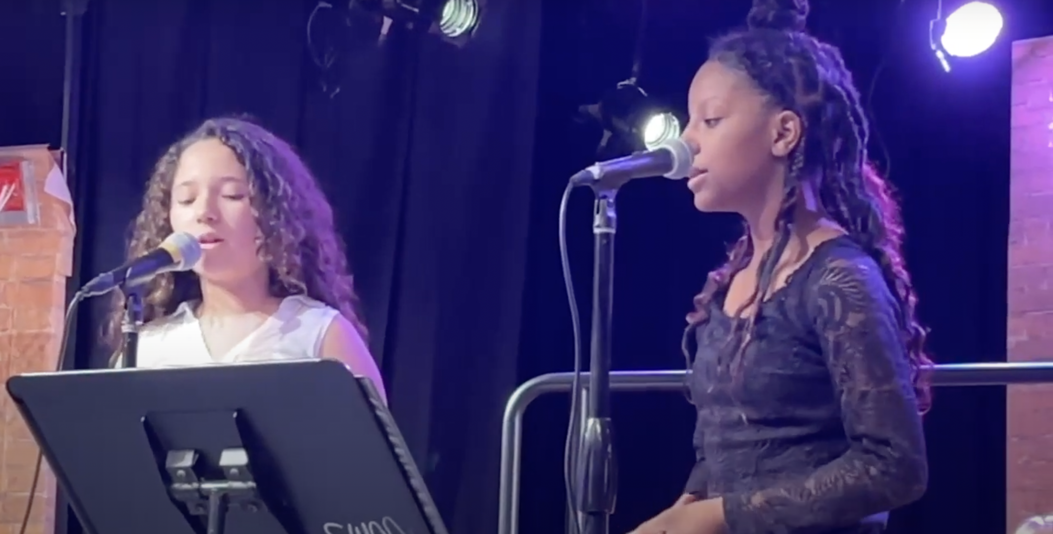 6th graders singing on stage